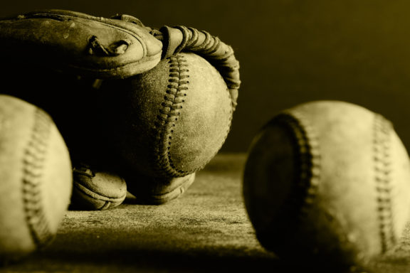 Baseball glove and baseballs