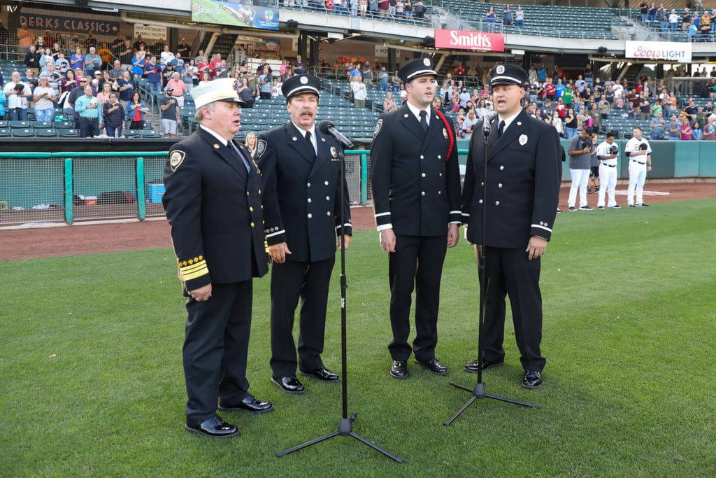 911Anthem First responders performed the national anthem.