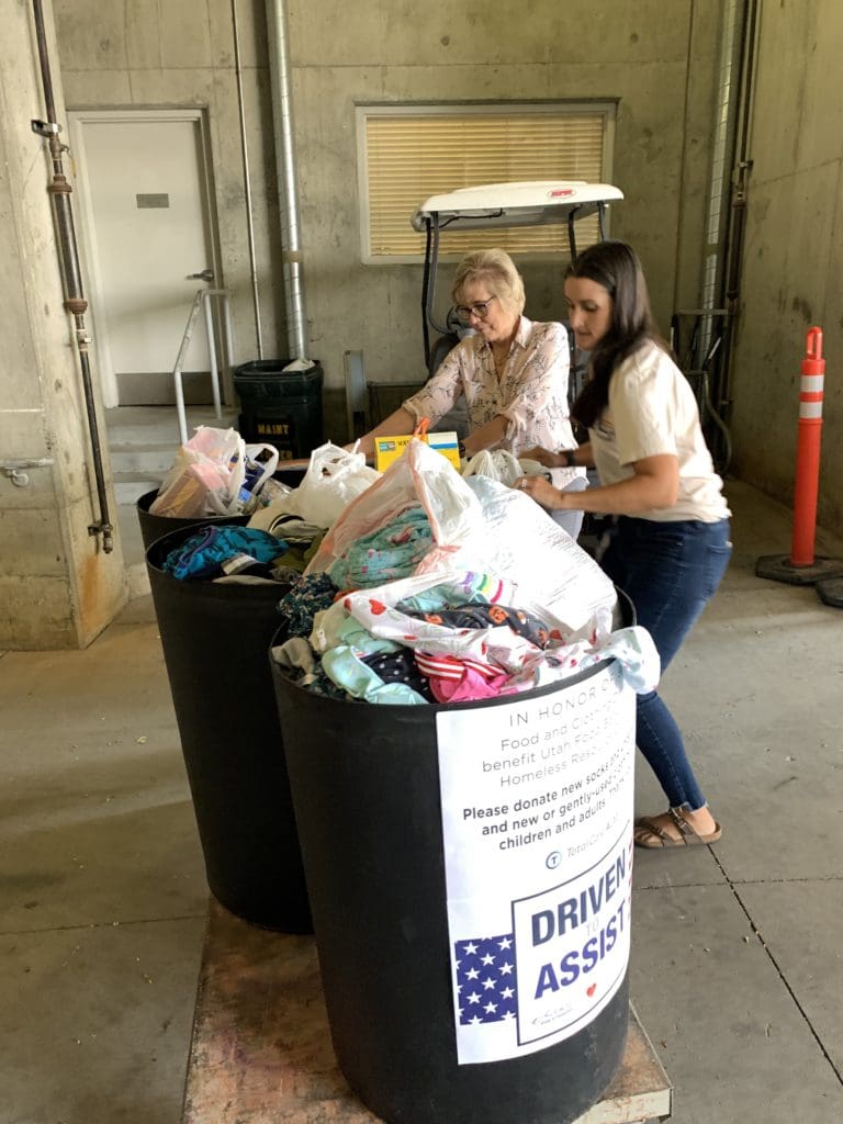 IMG_4574 Employees with donation barrels